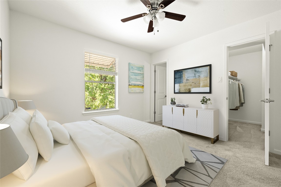 3204 Menchaca Road, Unit 216 Austin, TX 78704 - Photo 15 of 38 a bedroom with a bed and a flat screen tv