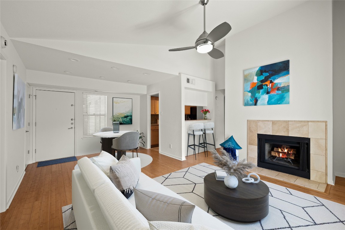 3204 Menchaca Road, Unit 216 Austin, TX 78704 - Photo 2 of 38 a living room with furniture and a fireplace