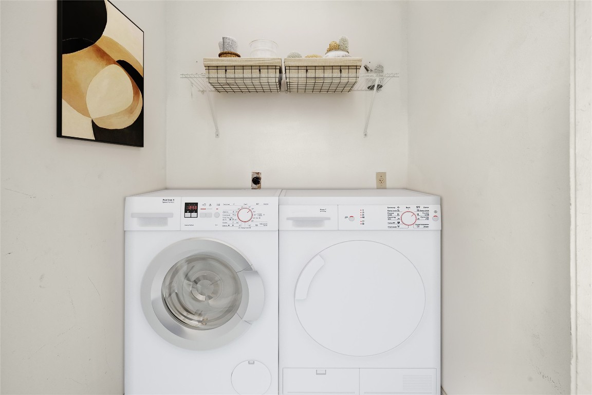 3204 Menchaca Road, Unit 216 Austin, TX 78704 - Photo 23 of 38 a utility room with dryer and washer