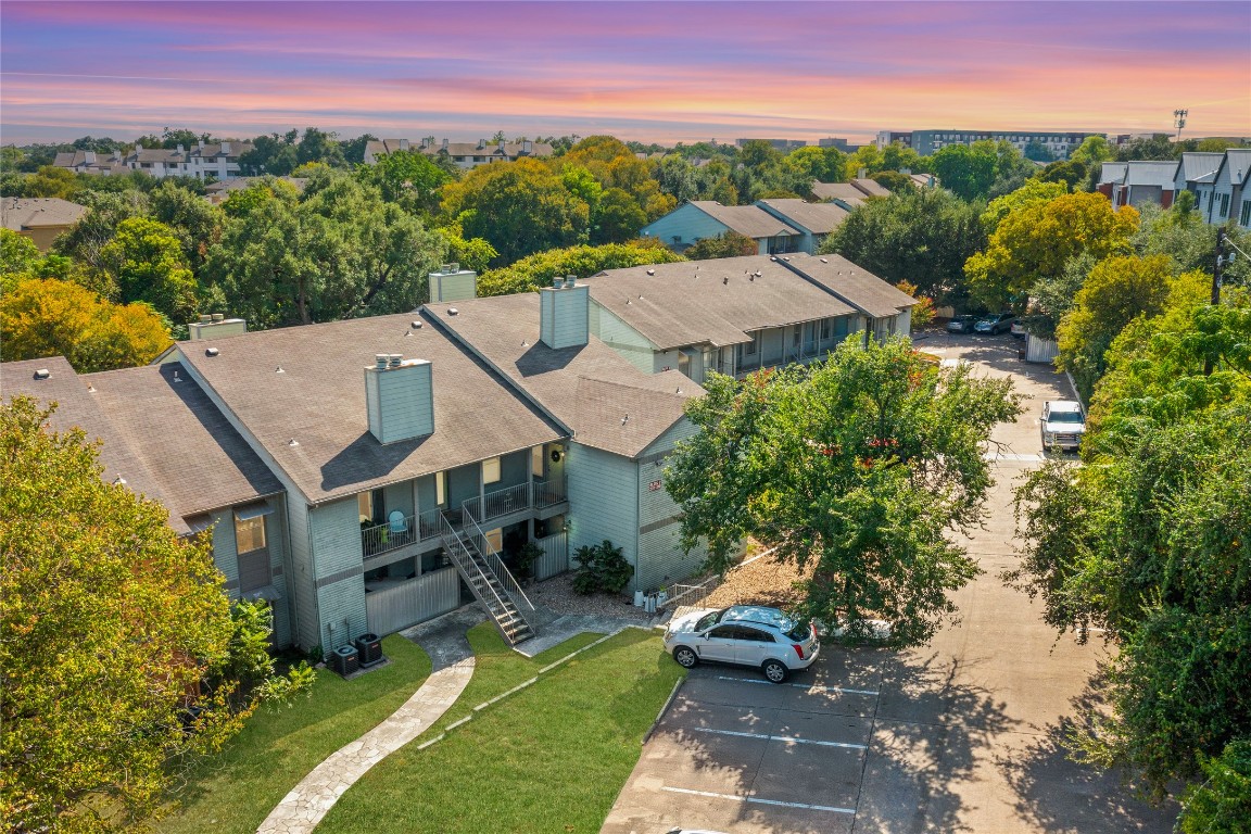 3204 Menchaca Road, Unit 216 Austin, TX 78704 - Photo 30 of 38 an aerial view of a house with swimming pool and garden