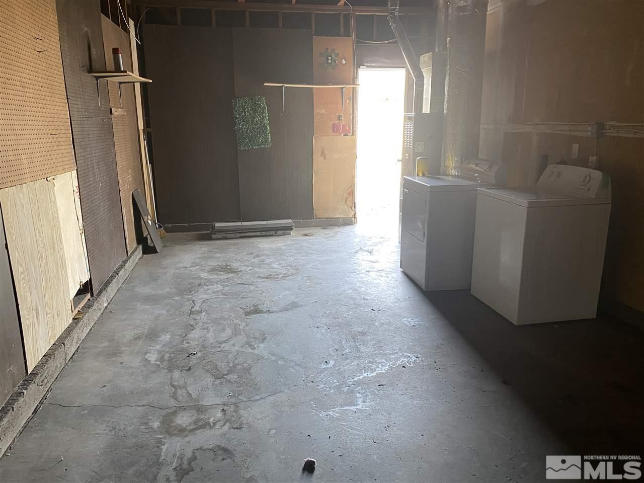 1165 Manhattan Street Reno, NV 89512 - Photo 12 of 14 a view of empty room with windows