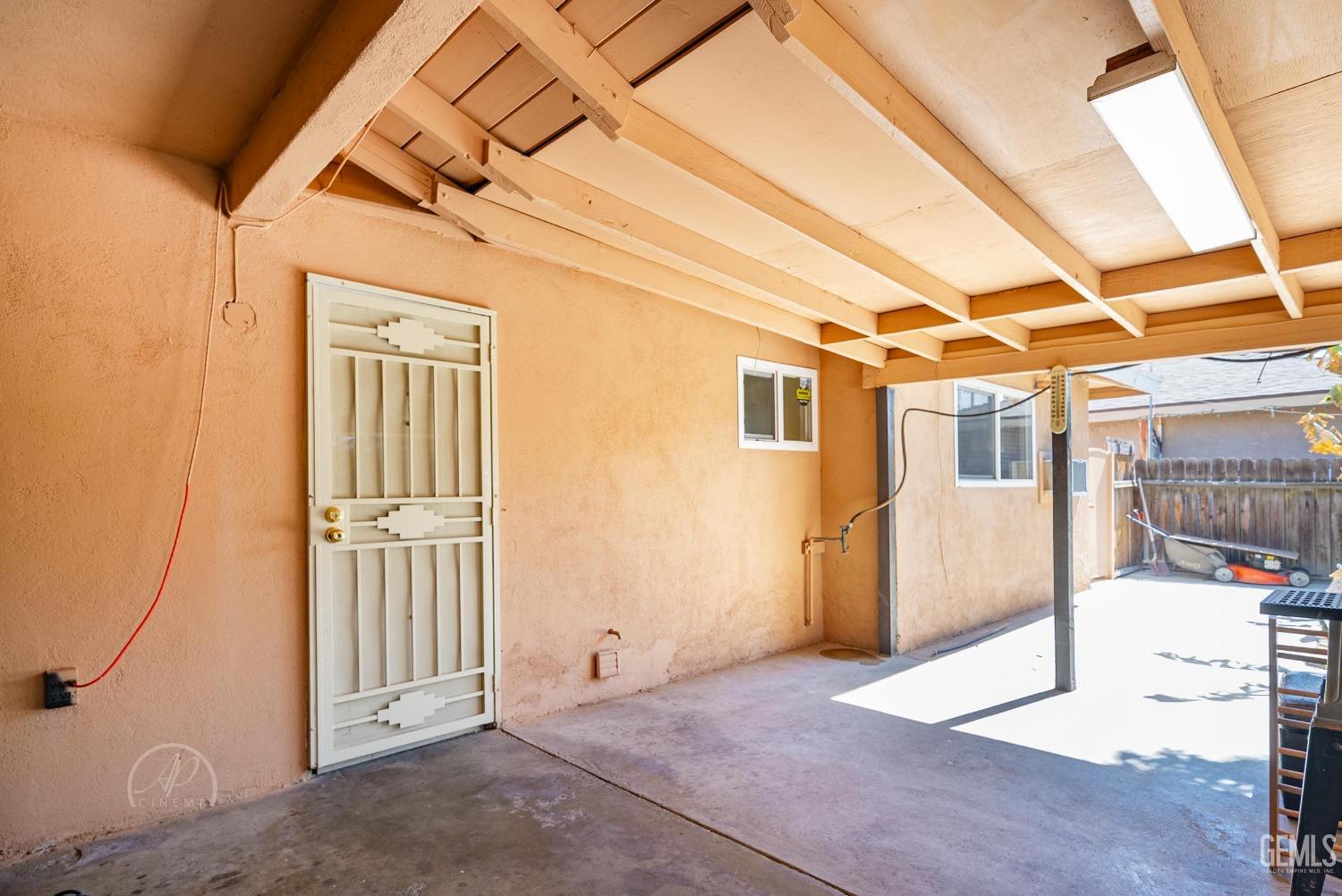 Undisclosed Address Bakersfield, CA 93307 - Photo 21 of 26 a view of a hallway with a white house