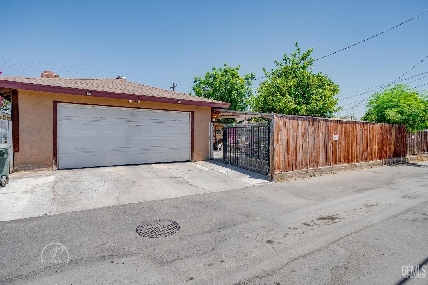 Undisclosed Address Bakersfield, CA 93307 - Photo 24 of 26 a view of outdoor space and garage