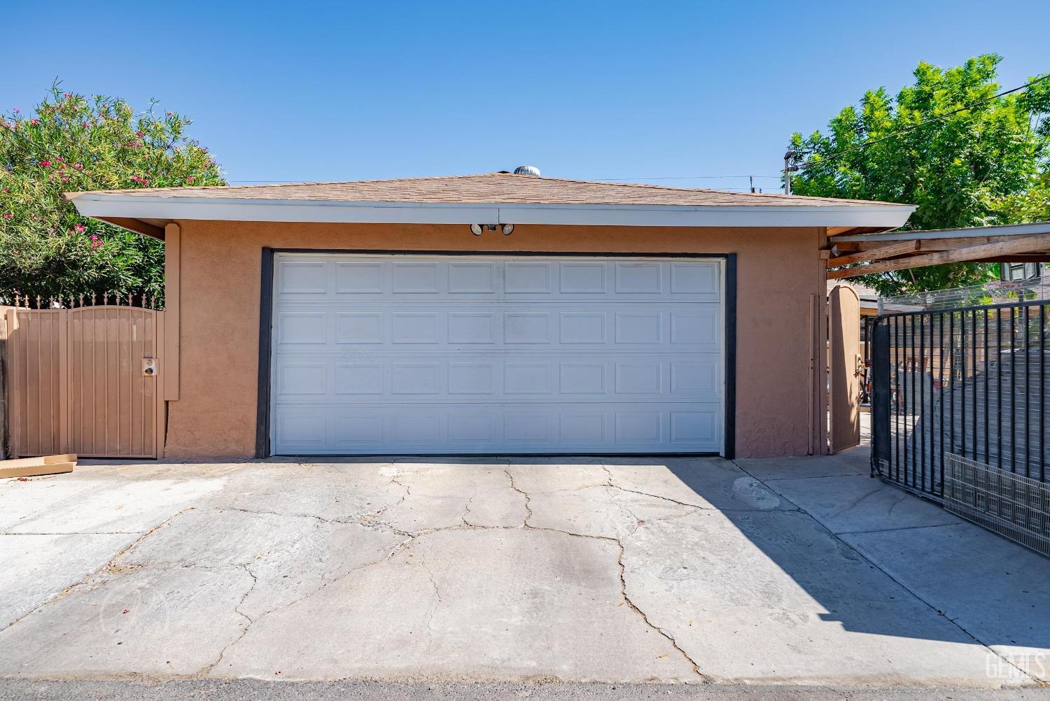 Undisclosed Address Bakersfield, CA 93307 - Photo 25 of 26 a view of entryway with a tree
