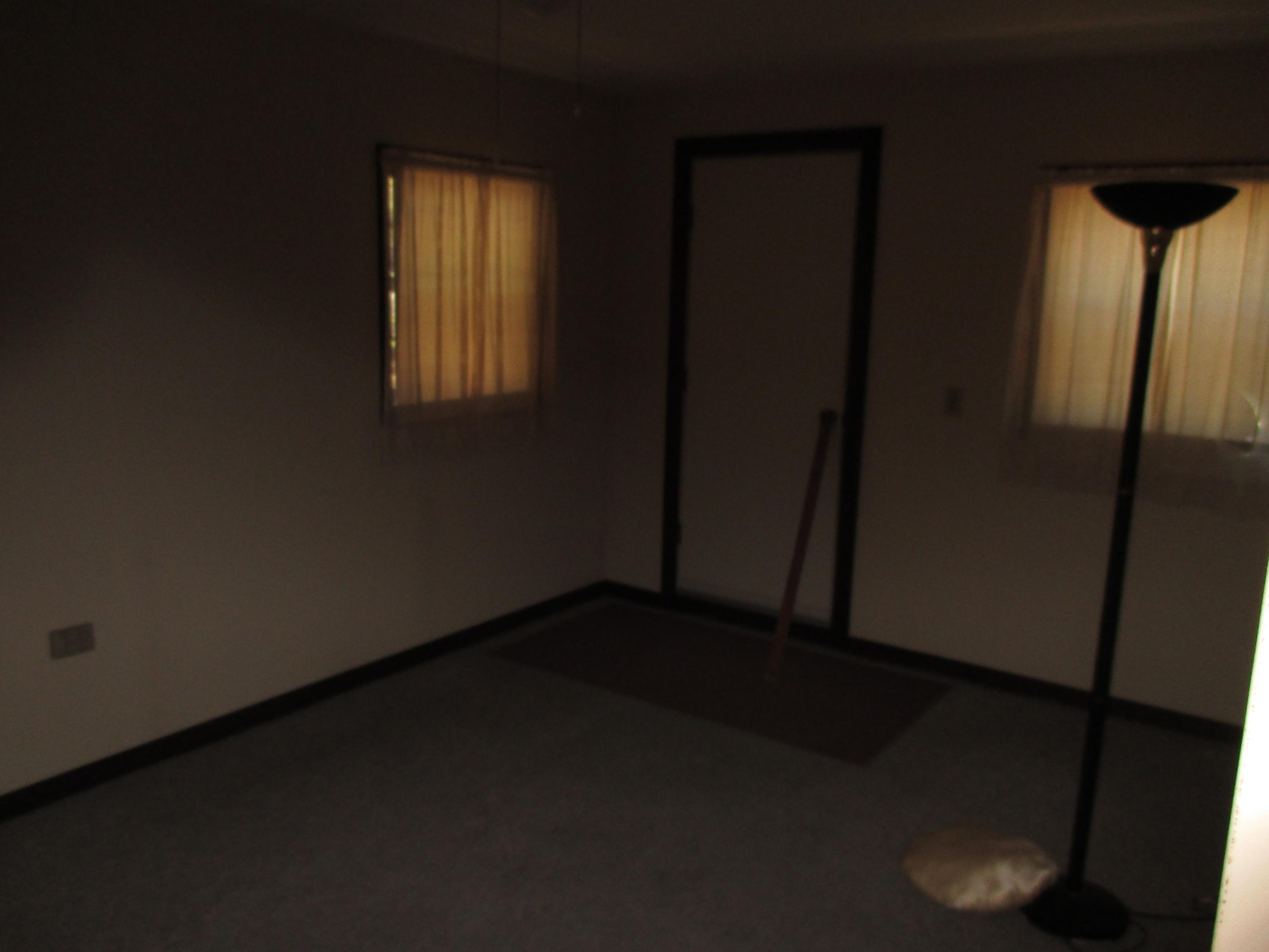 419 Christian Life Road DeFuniak Springs, FL 32433 - Photo 8 of 9 a view of empty room with wooden floor