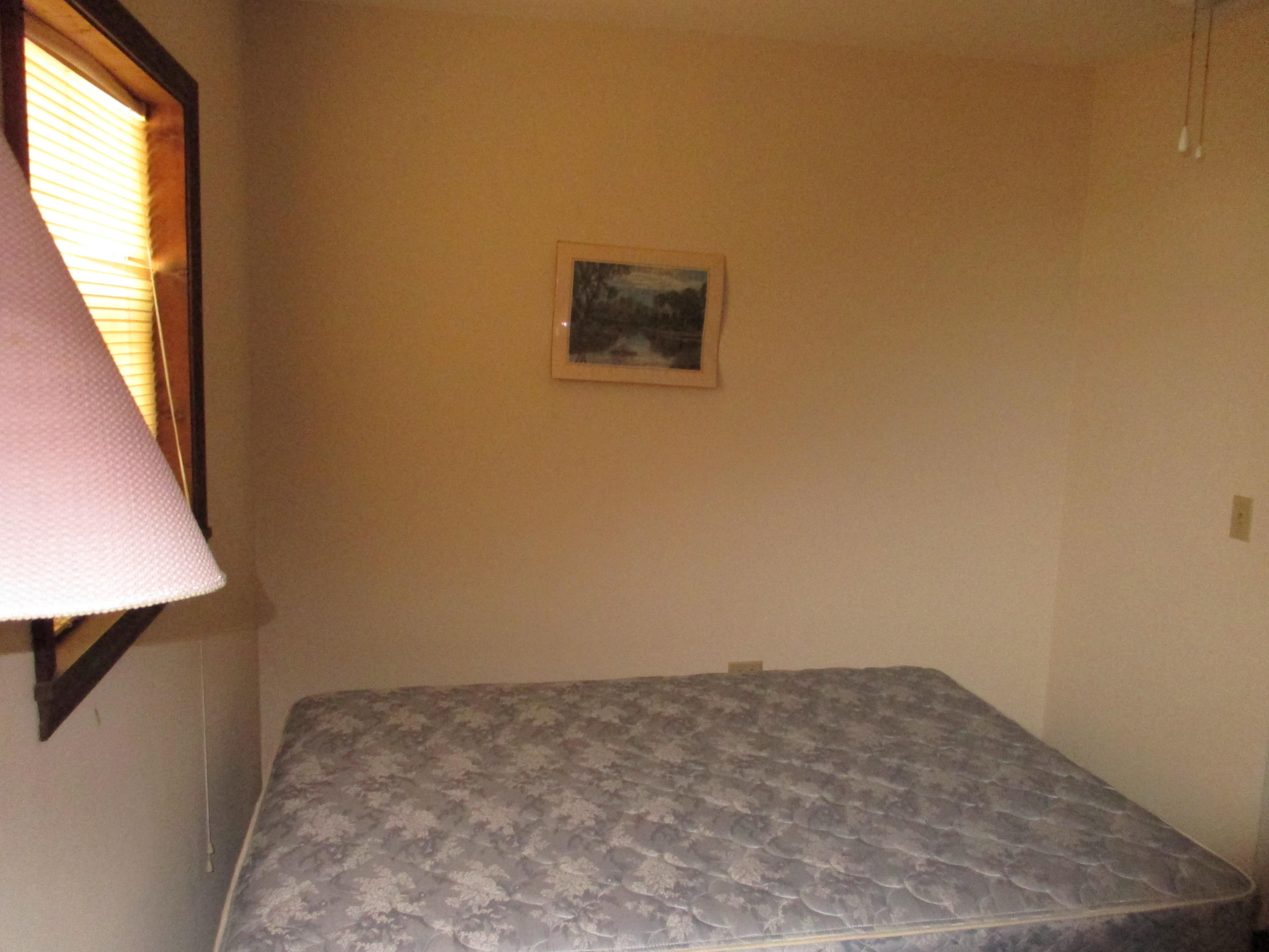 419 Christian Life Road DeFuniak Springs, FL 32433 - Photo 9 of 9 an empty room with a window