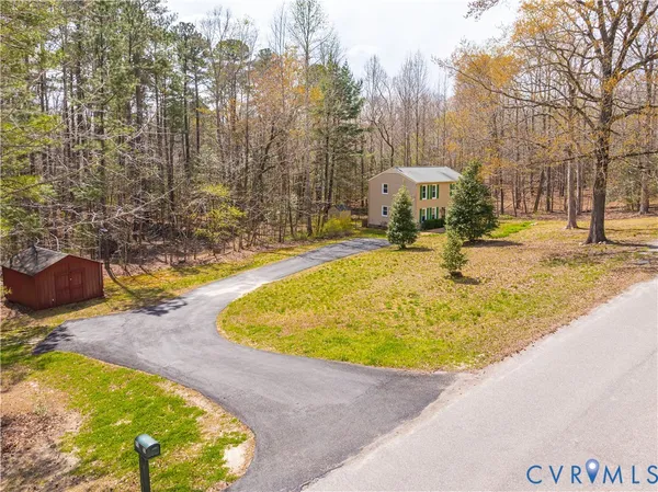 a view of a swimming pool with an outdoor space and seating area