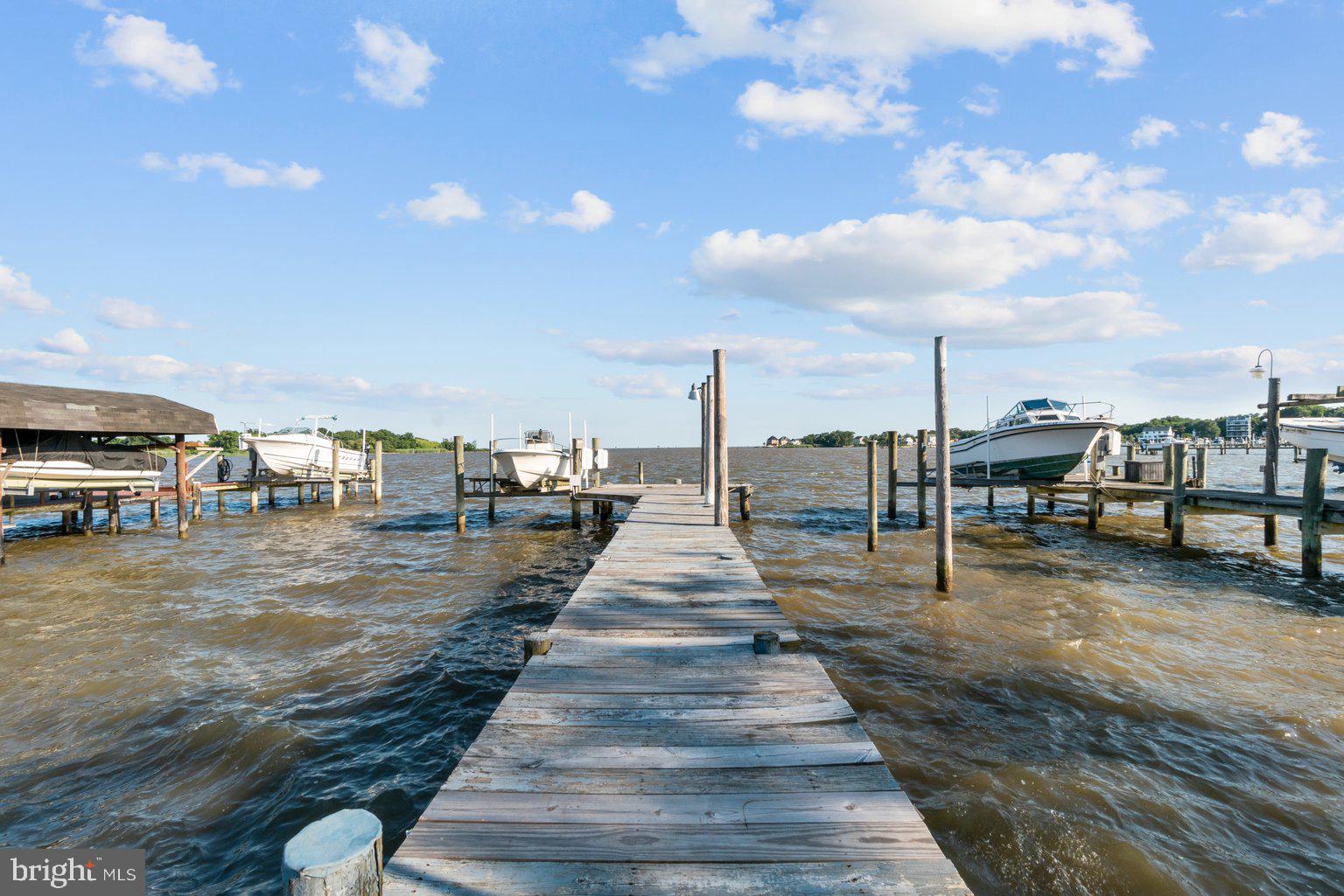 9205 Cuckold Point Road Sparrows Point, MD 21219 - Photo 36 of 47 Private 67ft pier with boat lift & mooring