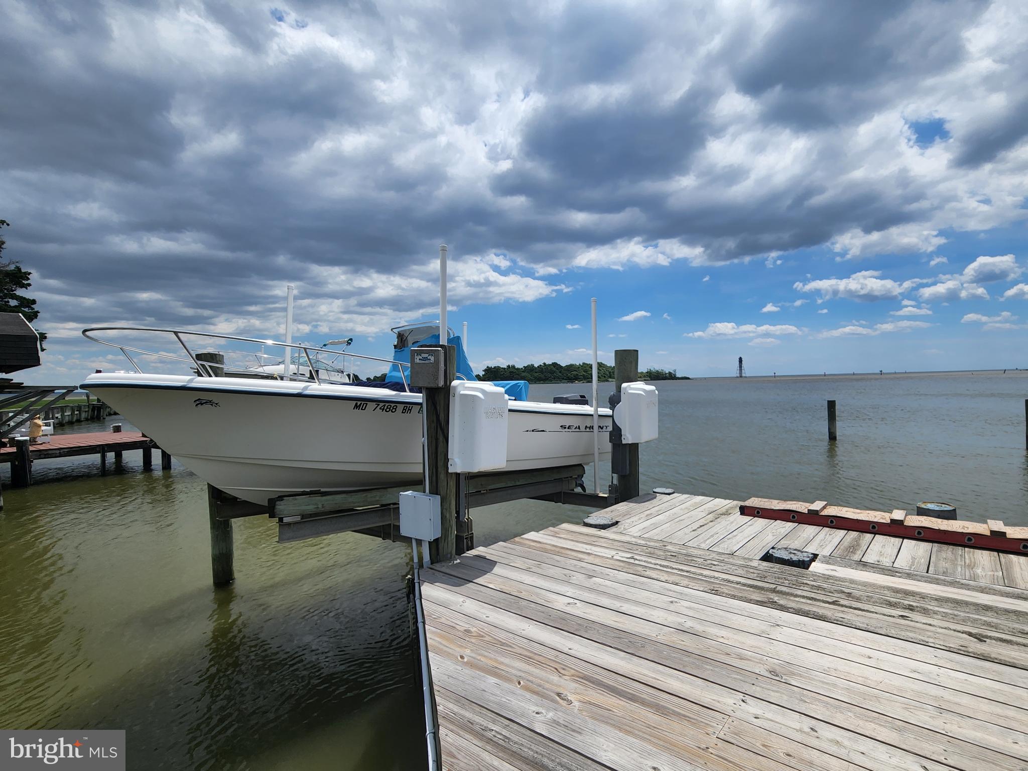 9205 Cuckold Point Road Sparrows Point, MD 21219 - Photo 37 of 47 Pier with 10k lb boat lift