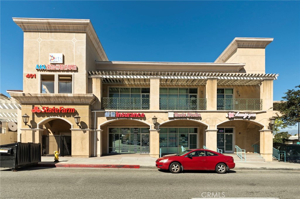 a view of a car park in front of house