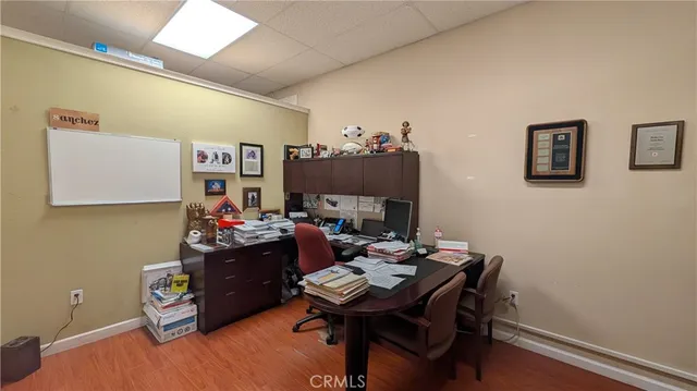 a view of a workspace with furniture