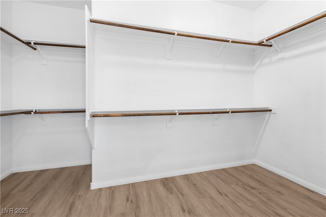 10059 Lady Apple Drive Las Vegas, NV 89148 - Photo 25 of 31 Spacious closet featuring light wood-style flooring