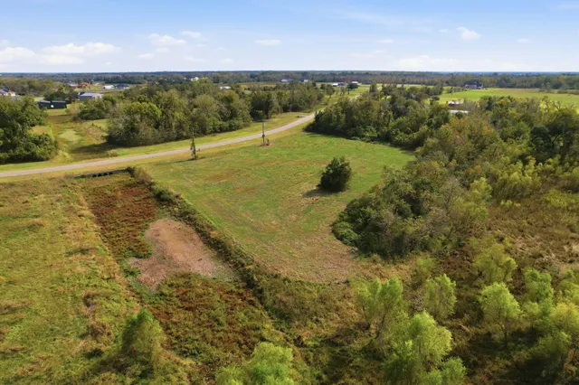 a view of an ocean beach and mountain
