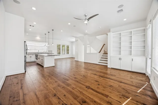 a view of kitchen and wooden floor