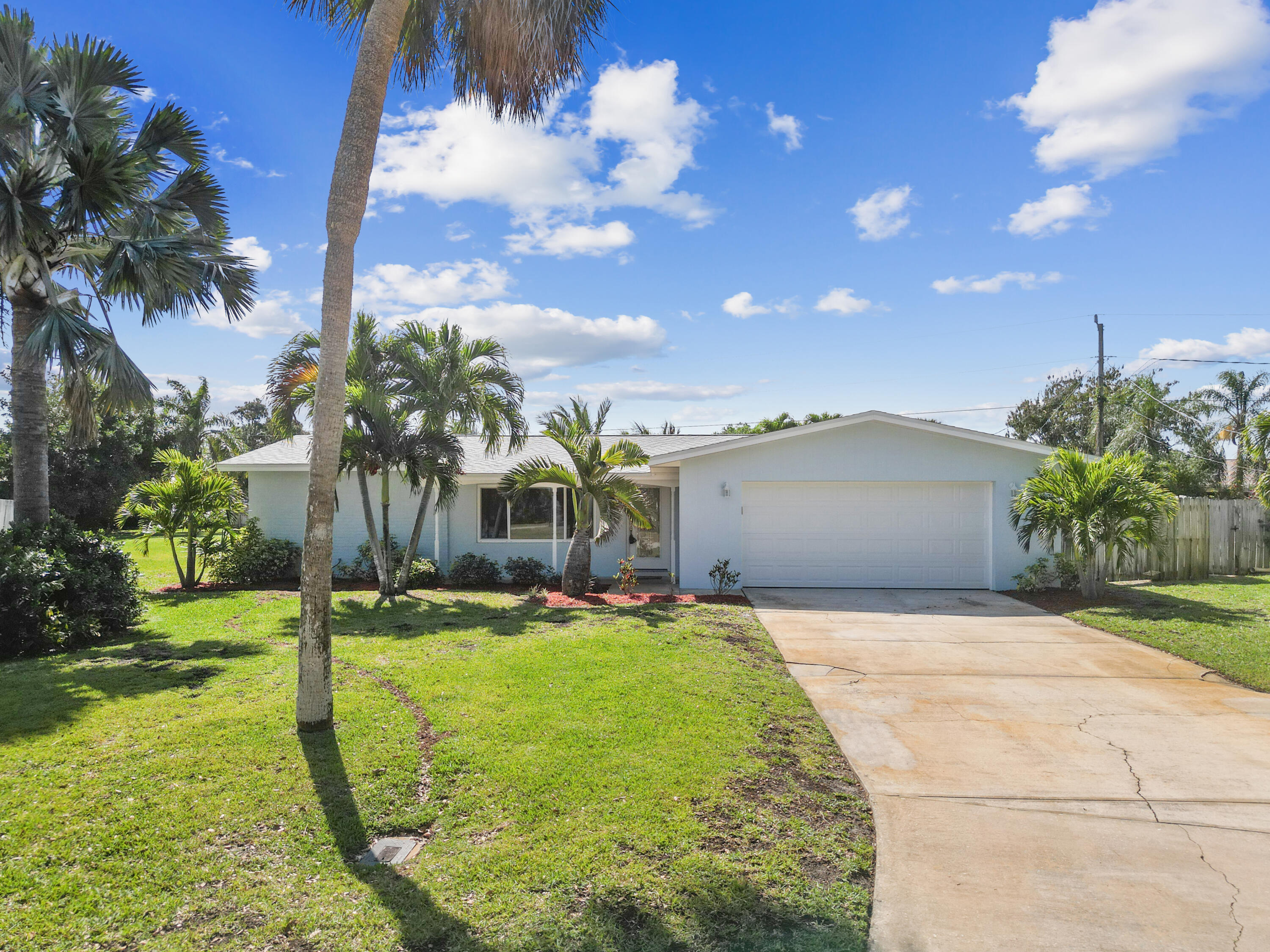 a front view of a house with yard