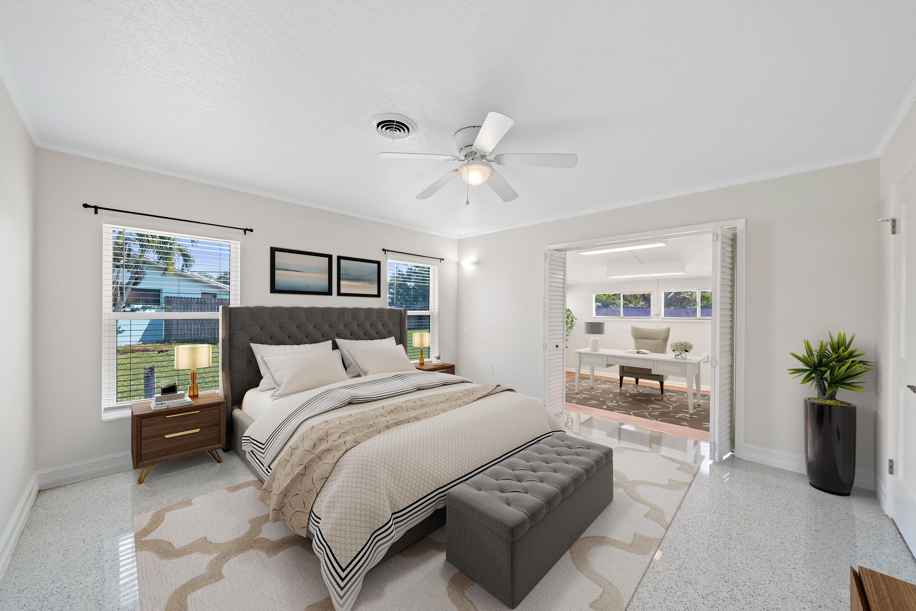 415 Rosedale Drive Satellite Beach, FL 32937 - Photo 12 of 52 a spacious bedroom with a bed a couch and potted plant with the outer view