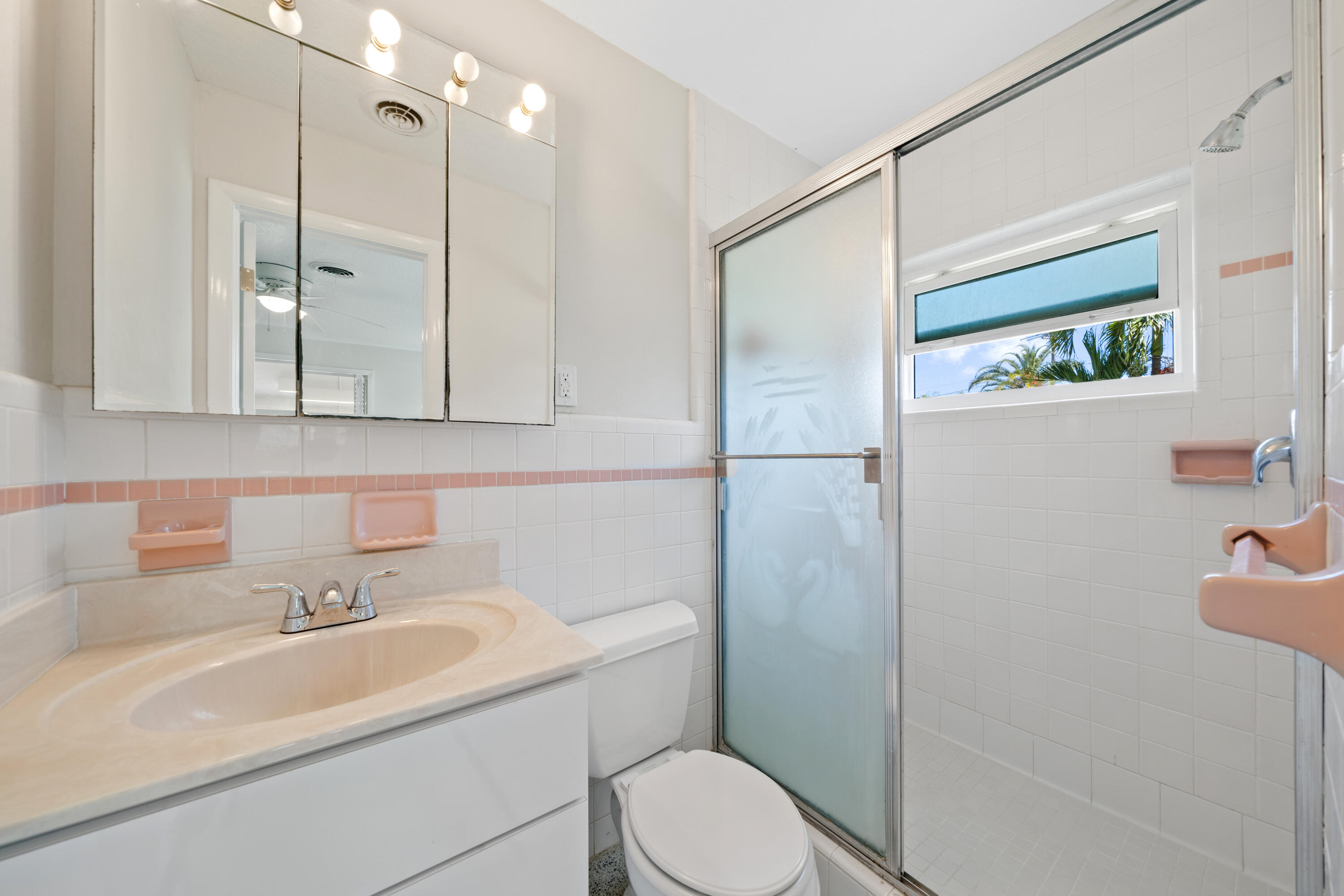 415 Rosedale Drive Satellite Beach, FL 32937 - Photo 16 of 52 a bathroom with a sink a toilet and shower