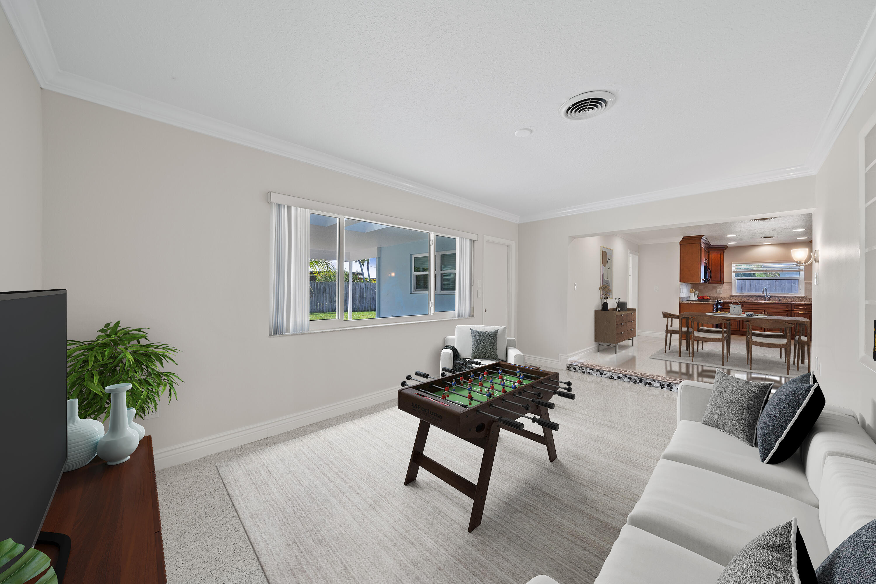 415 Rosedale Drive Satellite Beach, FL 32937 - Photo 17 of 52 a living room with furniture and a potted plant
