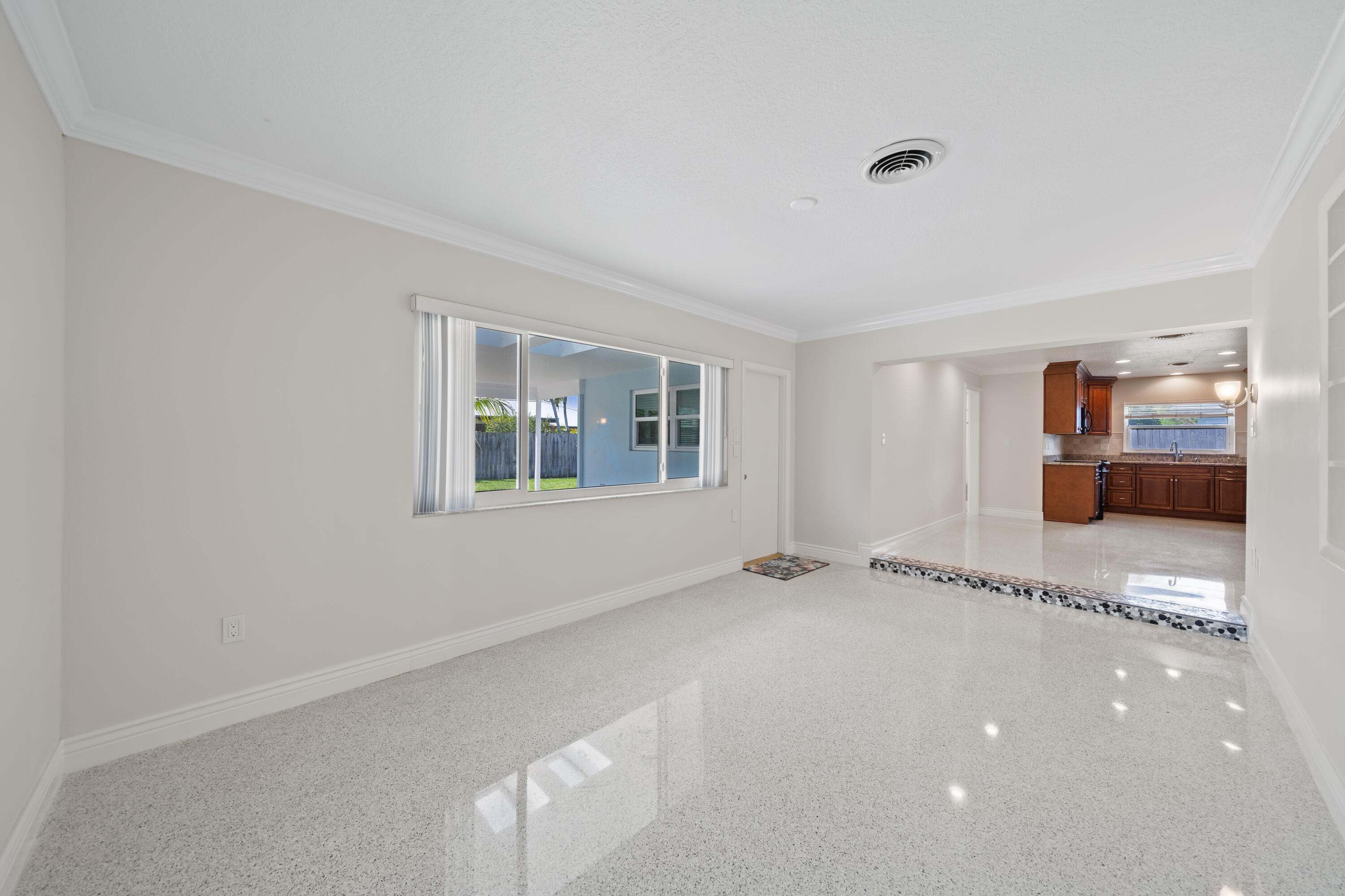 415 Rosedale Drive Satellite Beach, FL 32937 - Photo 18 of 52 a view of an empty room with a window