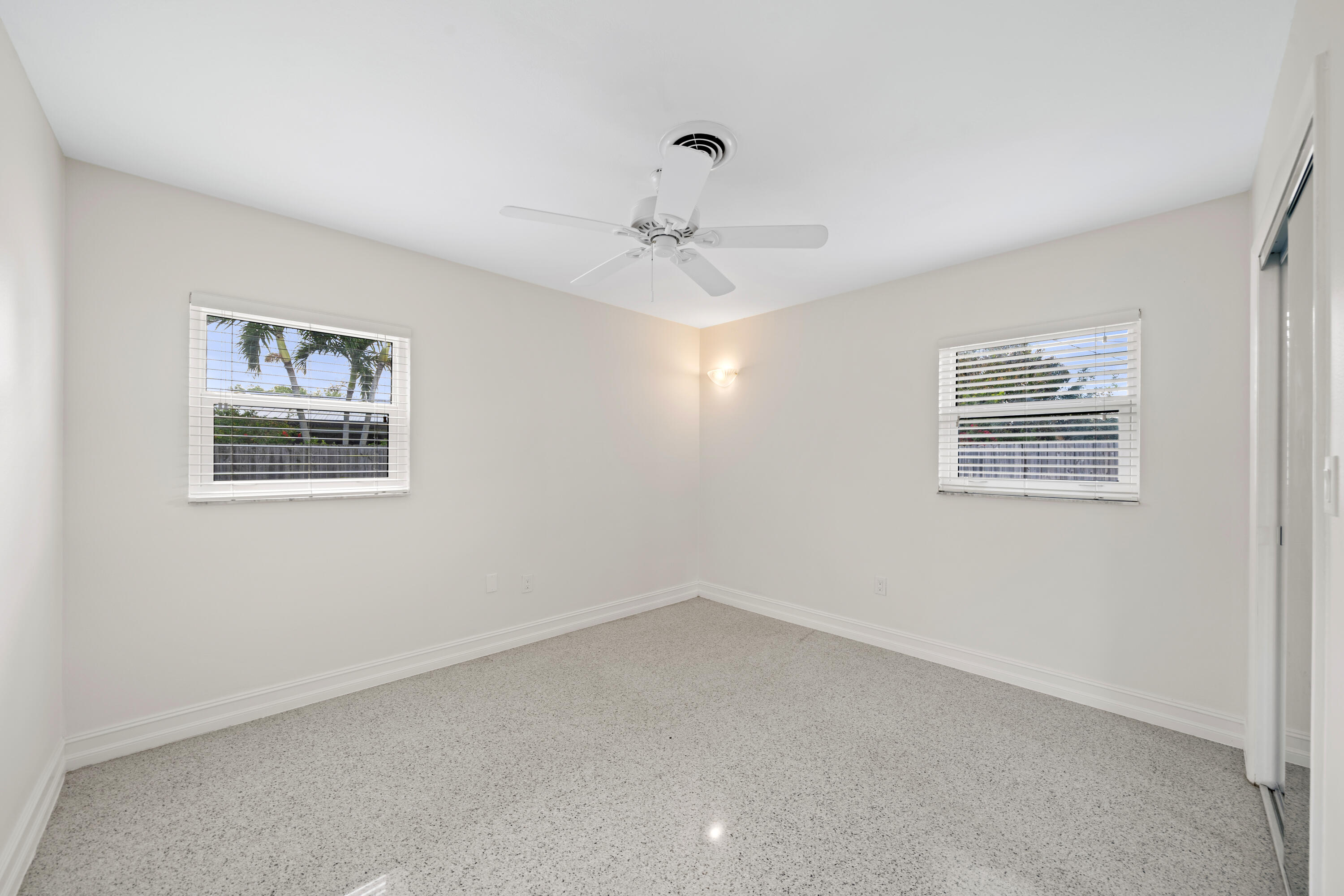 415 Rosedale Drive Satellite Beach, FL 32937 - Photo 27 of 52 a view of an empty room with a window