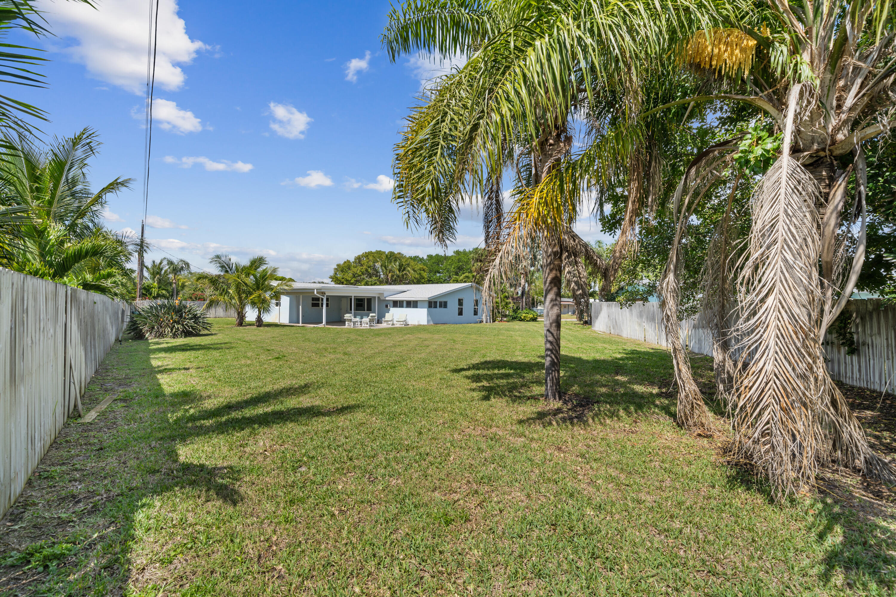 415 Rosedale Drive Satellite Beach, FL 32937 - Photo 35 of 52 a green field with lots of trees