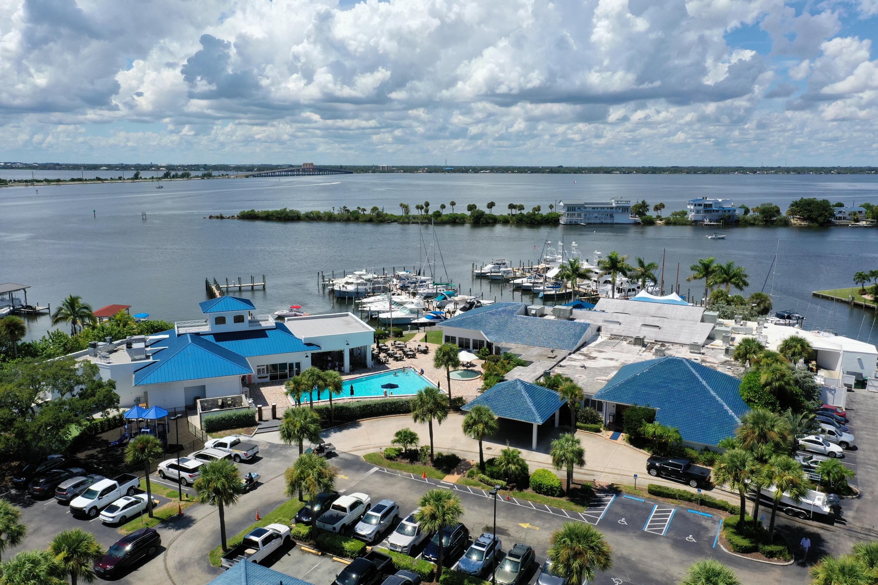 415 Rosedale Drive Satellite Beach, FL 32937 - Photo 45 of 52 an aerial view of a house with a lake view