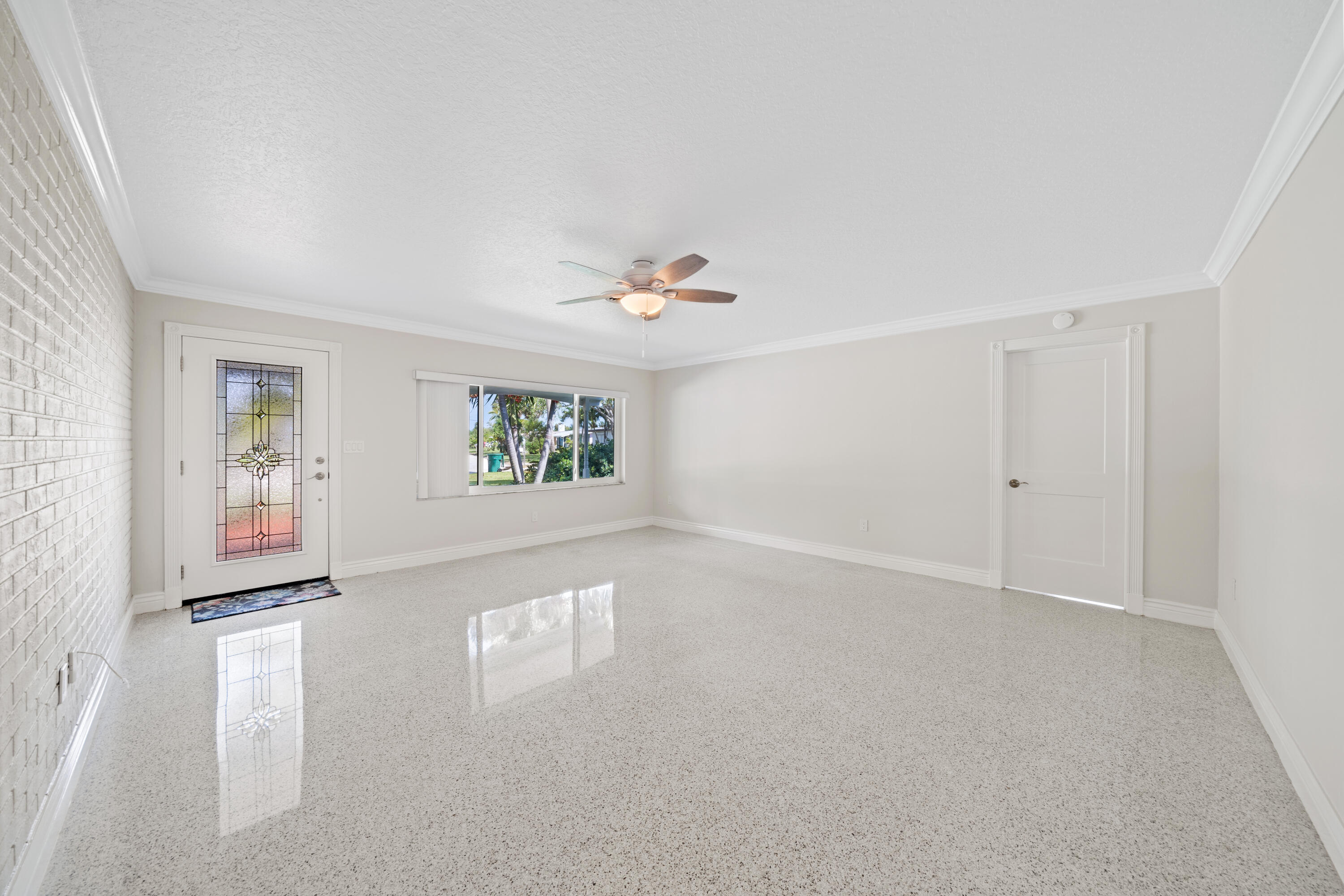 415 Rosedale Drive Satellite Beach, FL 32937 - Photo 7 of 52 a view of an empty room with a window