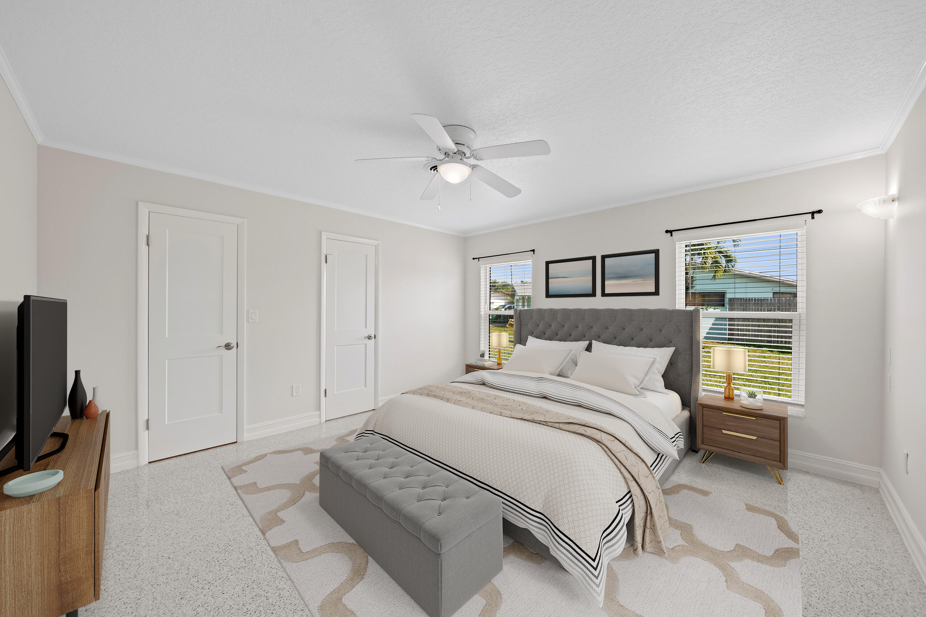415 Rosedale Drive Satellite Beach, FL 32937 - Photo 10 of 52 a bedroom with a bed and a television