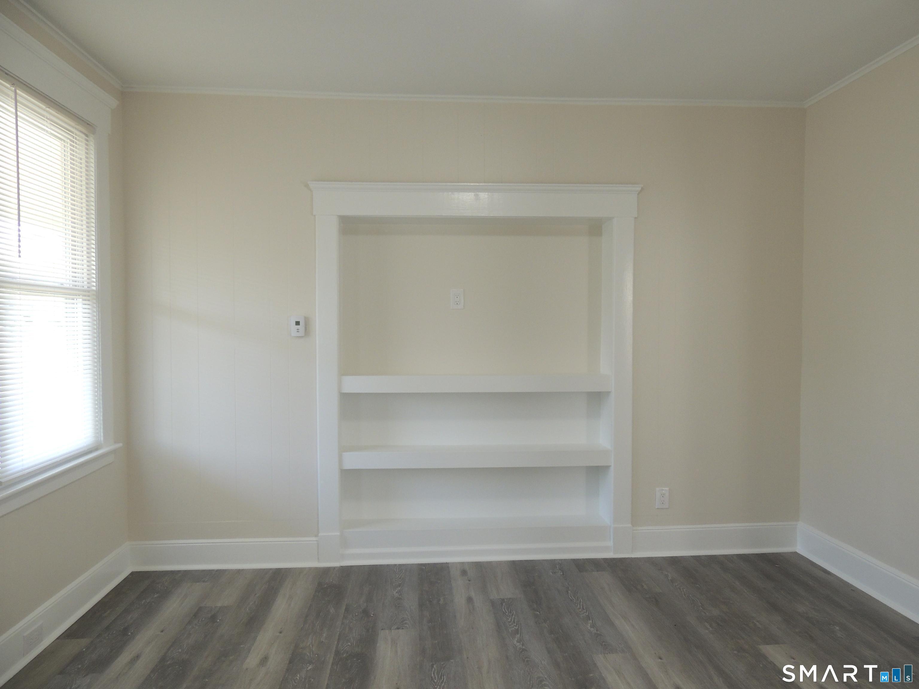 132 Silver Sands Road, Unit 1 East Haven, CT 06512 - Photo 5 of 20 Built in bookshelves