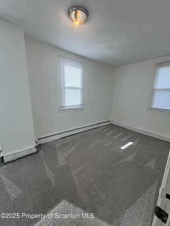an empty room with a workbench