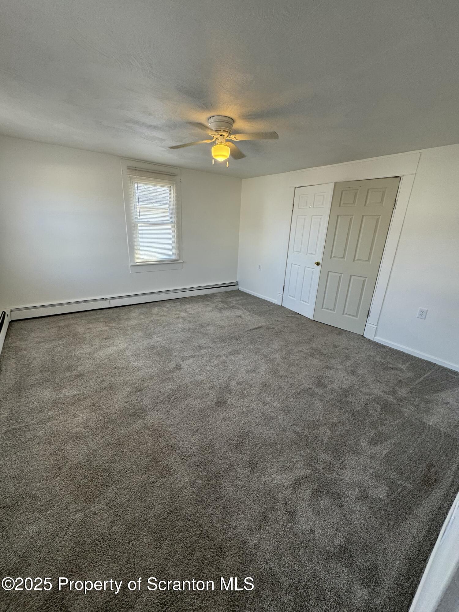1135 Lloyd Street, Unit 2 Scranton, PA 18508 - Photo 5 of 18 a view of an empty room with a window