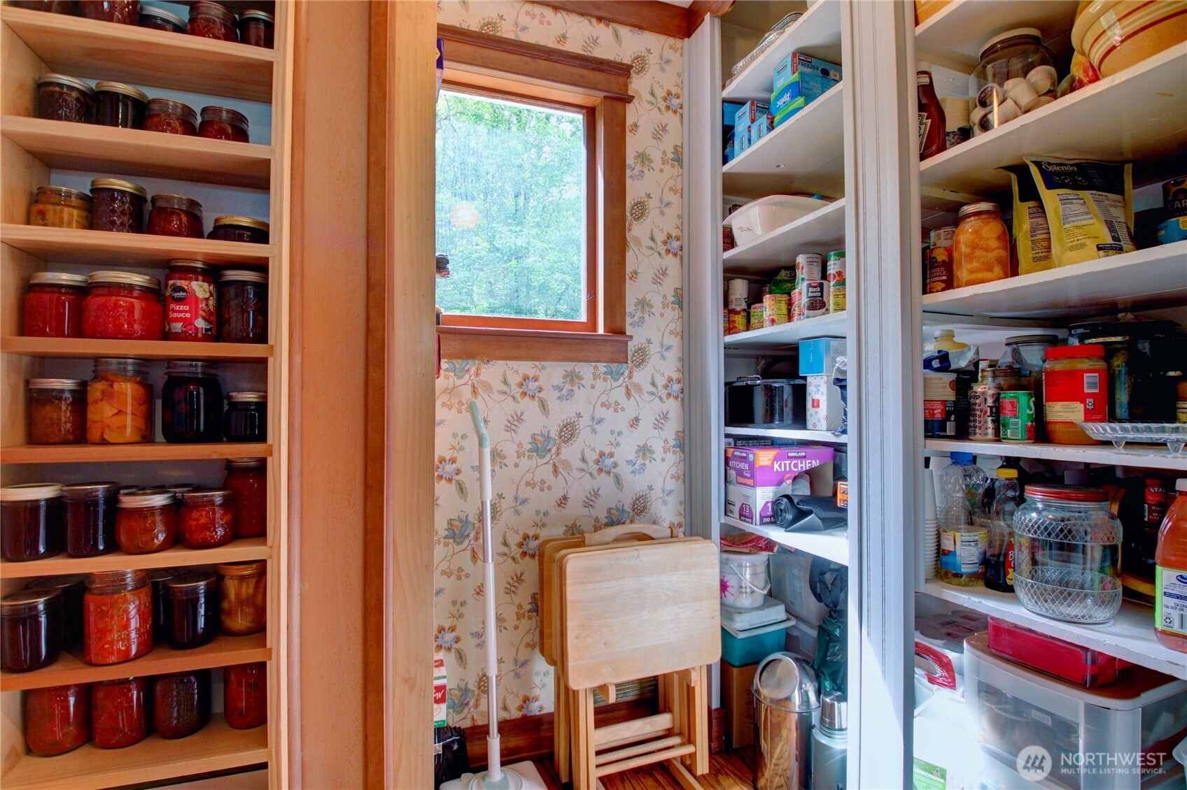 2909 Overpass Road Bow, WA 98232 - Photo 21 of 40 a room with furniture and a book shelf