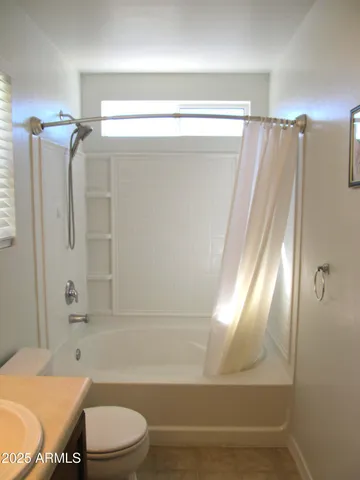 an empty room with closet area