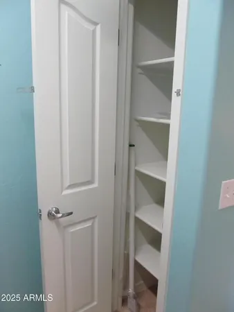 a room with table and chairs