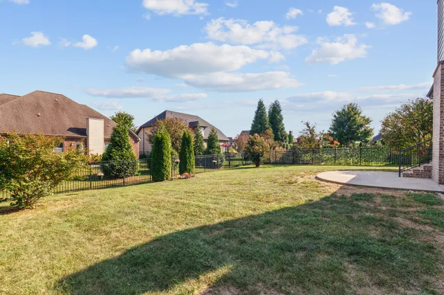 a view of a house with a big yard