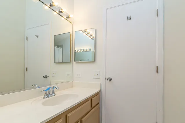 a view of a room with a furniture and a window