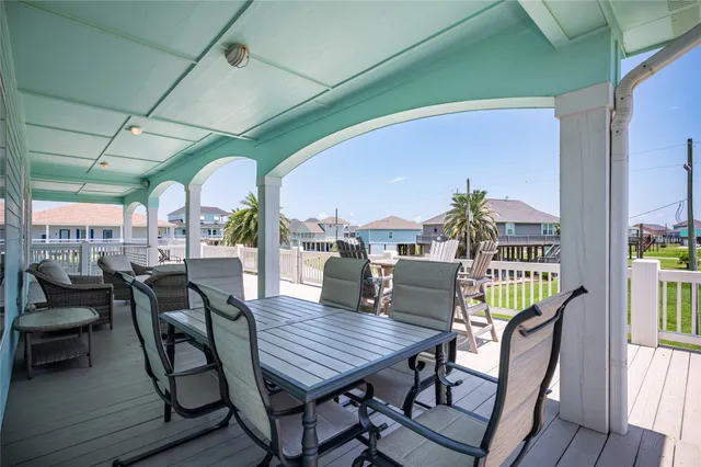 an outdoor space with furniture and outdoor view