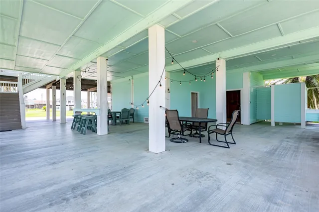 a view of outdoor space with porch and wooden floor