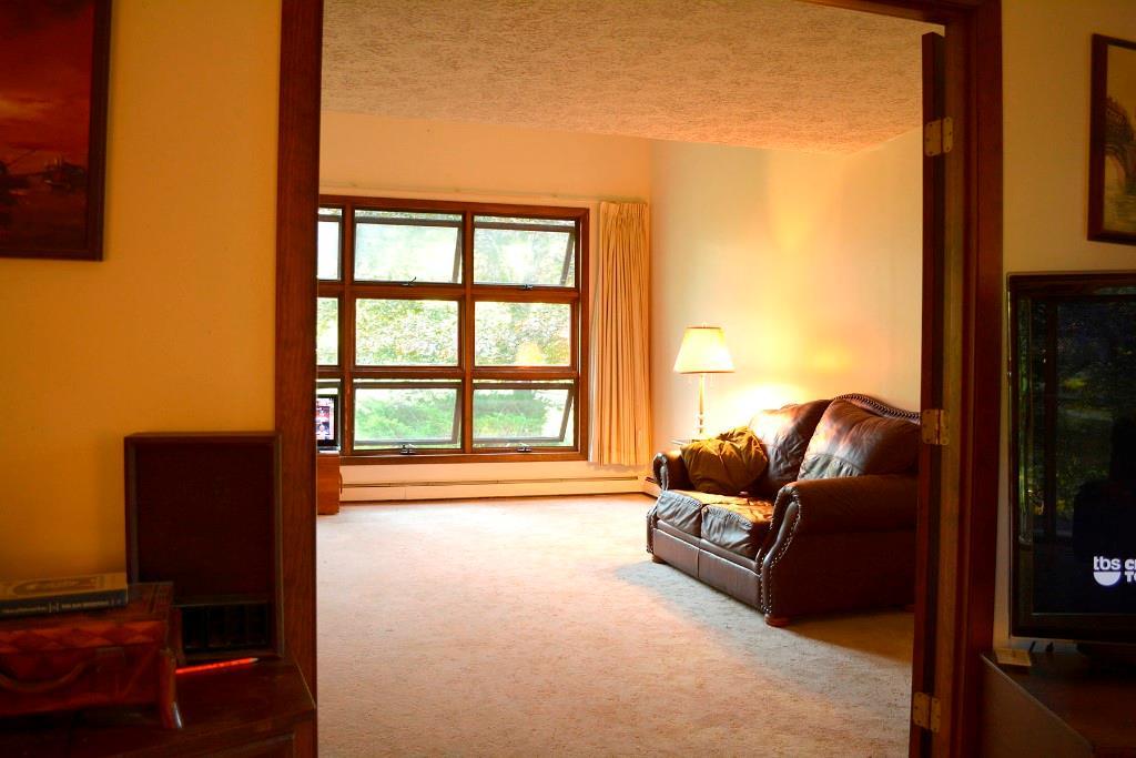 1457 Royalsborough Road Durham, ME 04222 - Photo 12 of 34 Expansive front window bathes the...