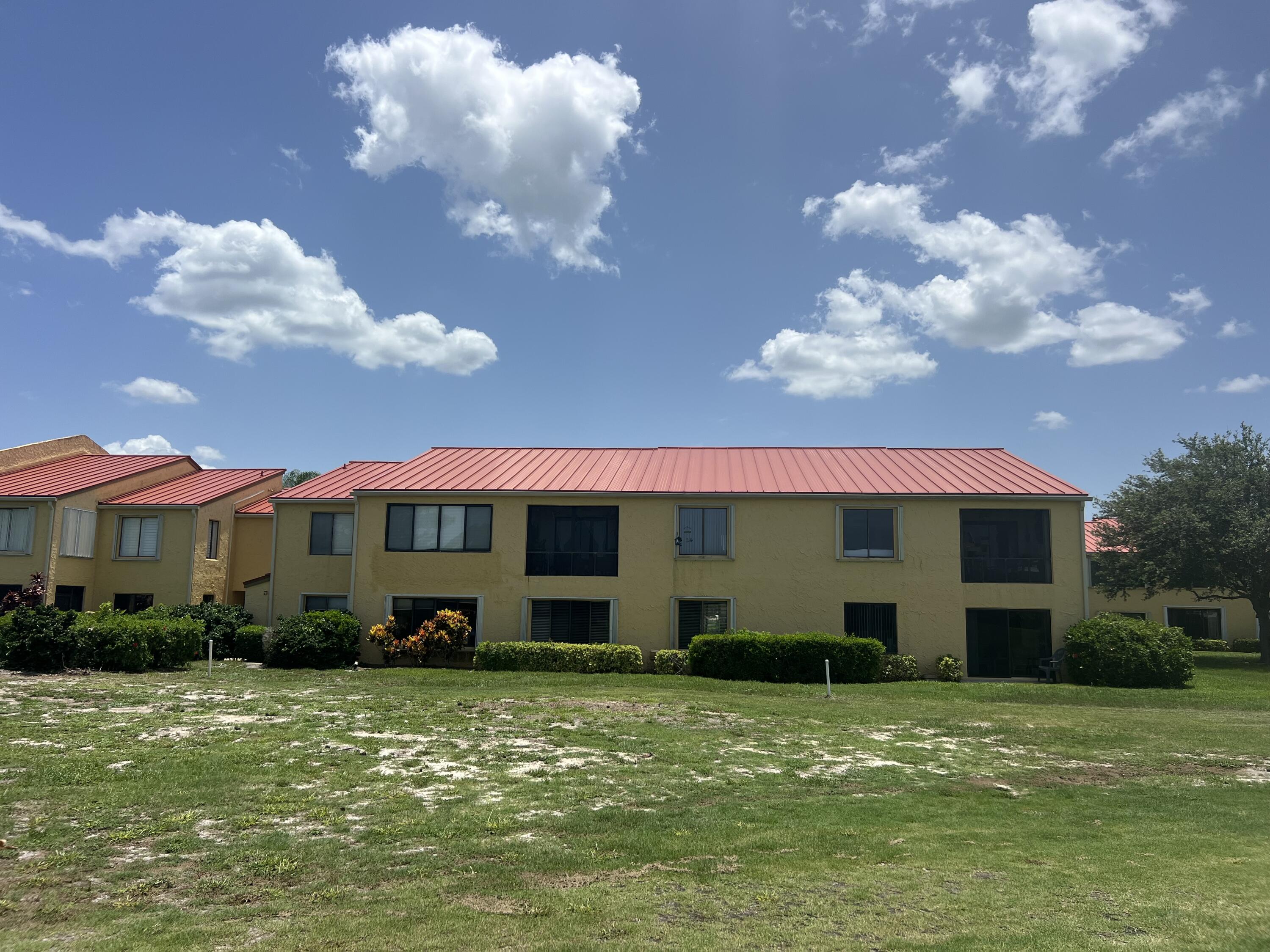5373 Southeast Miles Grant Road, Unit 102 Stuart, FL 34997 - Photo 3 of 87 rear of condo