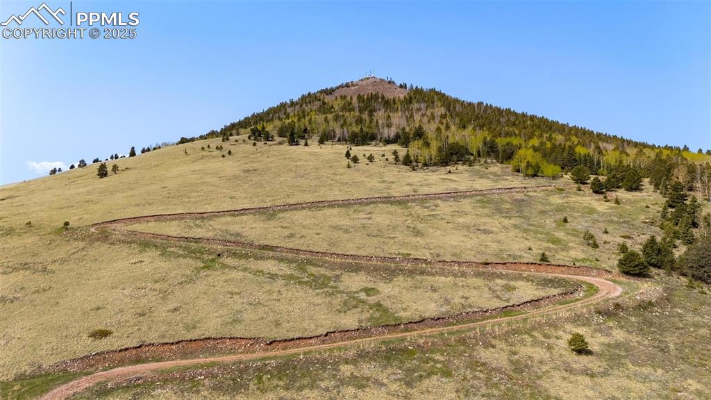 Conley Ranch Road Cripple Creek, CO 80813 - Photo 10 of 23 a view of a swimming pool with a yard