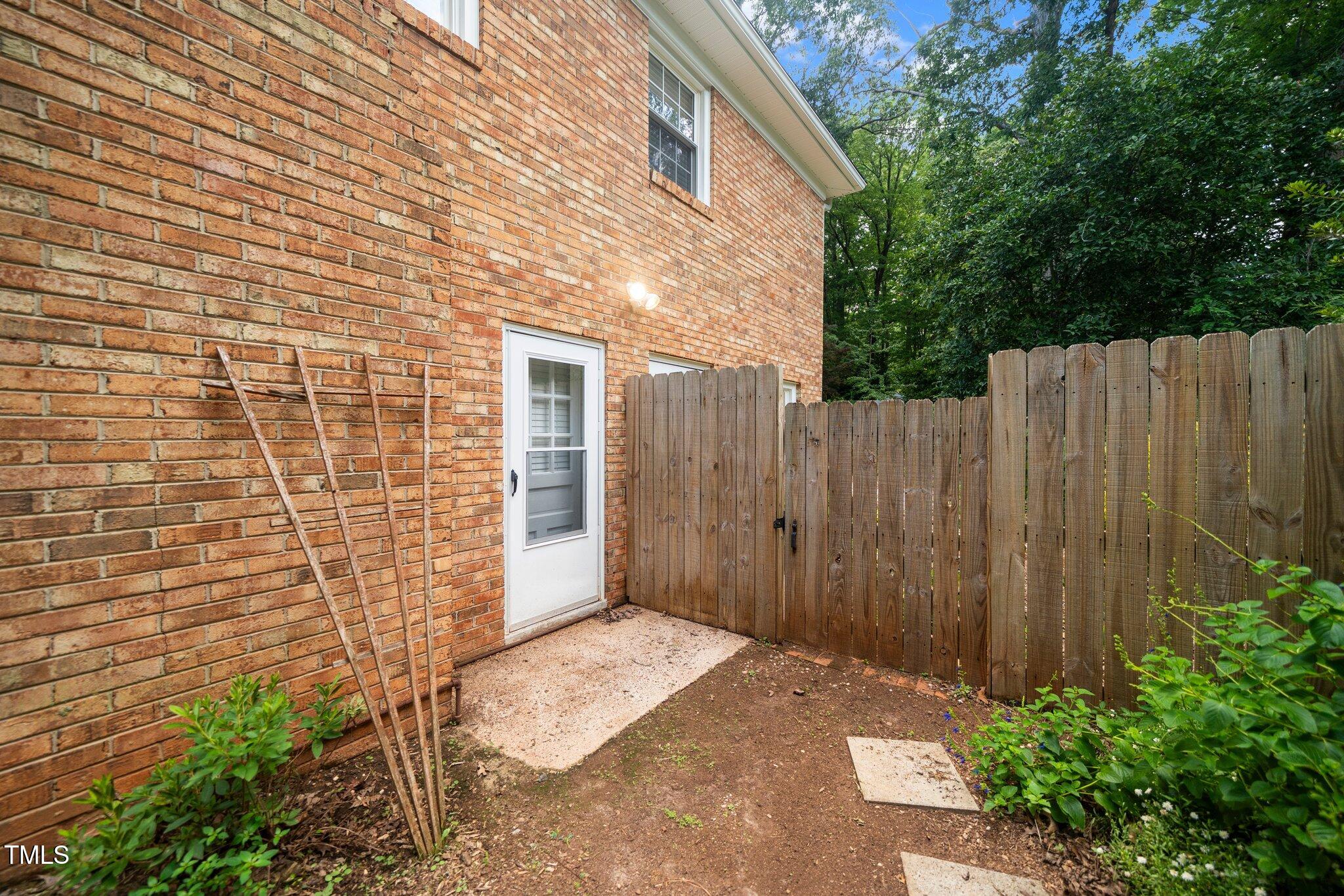 1312 Hampton Valley Road, Unit 10 Cary, NC 27511 - Photo 32 of 35 Side entrance to laundry room