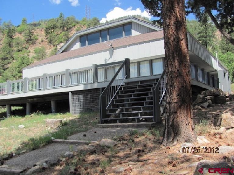 34341 Highway 550 Durango, CO 81301 - Photo 3 of 3 a view of a house with a yard