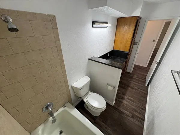 a bathroom with a sink and a toilet