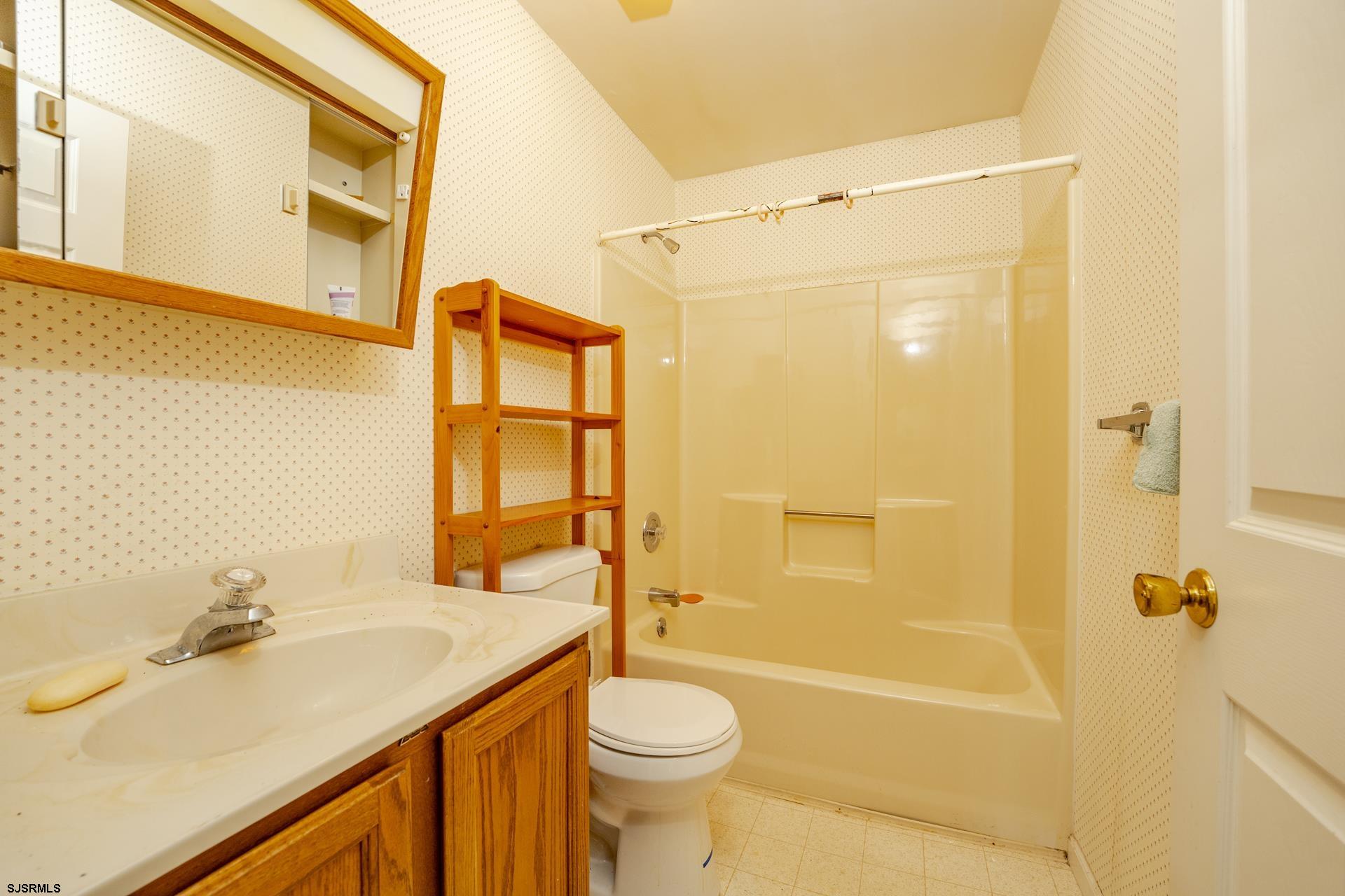 19 Clipper Court Atlantic City, NJ 08401 - Photo 14 of 53 a bathroom with a sink toilet and shower