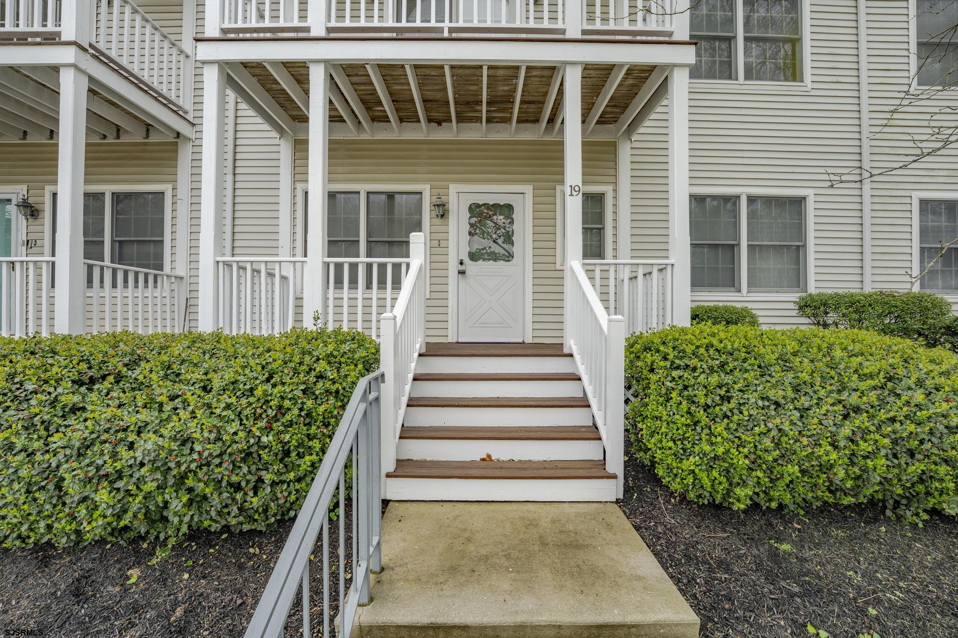 19 Clipper Court Atlantic City, NJ 08401 - Photo 2 of 53 a front view of a house with a garden