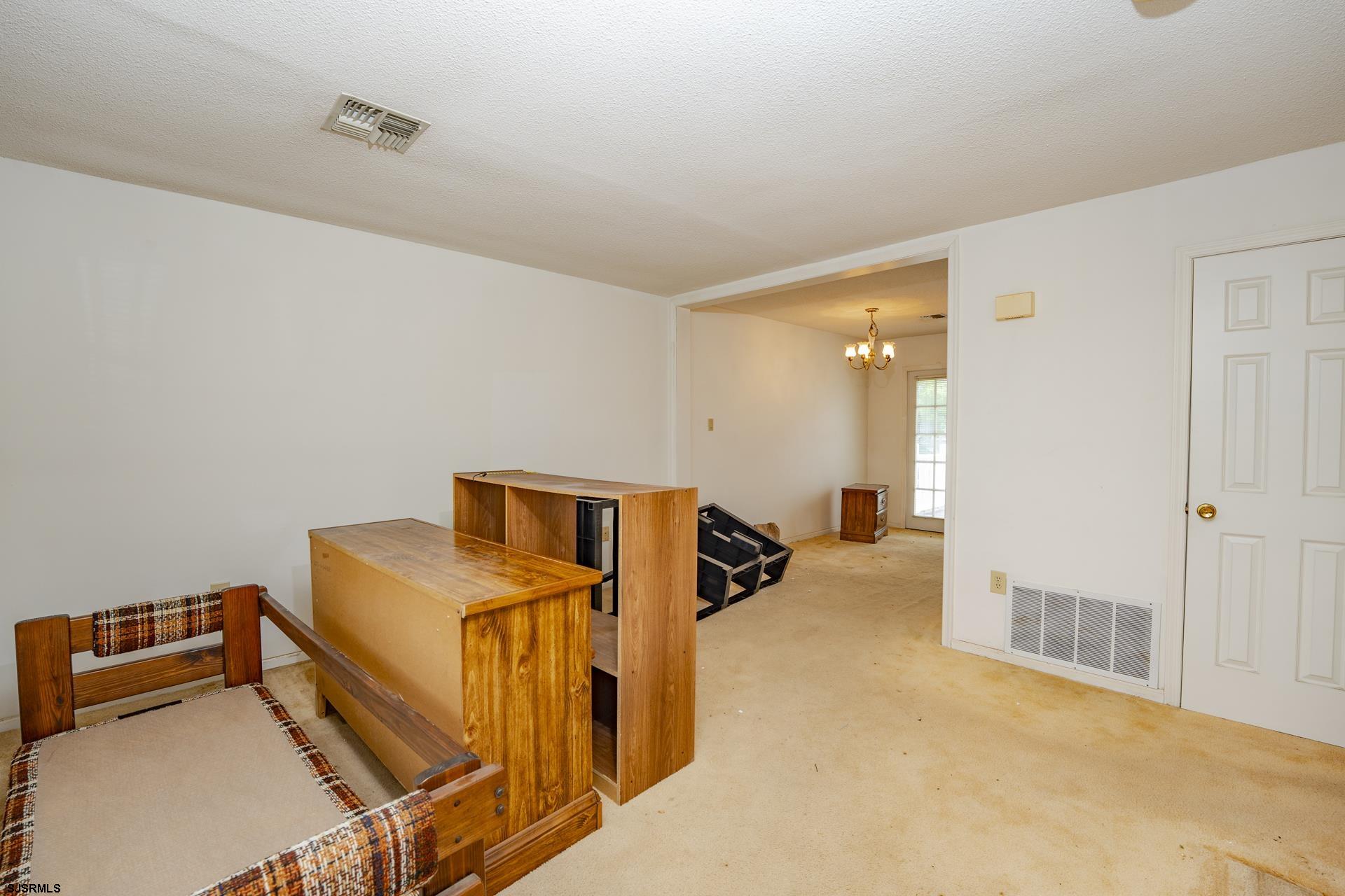 19 Clipper Court Atlantic City, NJ 08401 - Photo 3 of 53 a storage room with washer and dryer