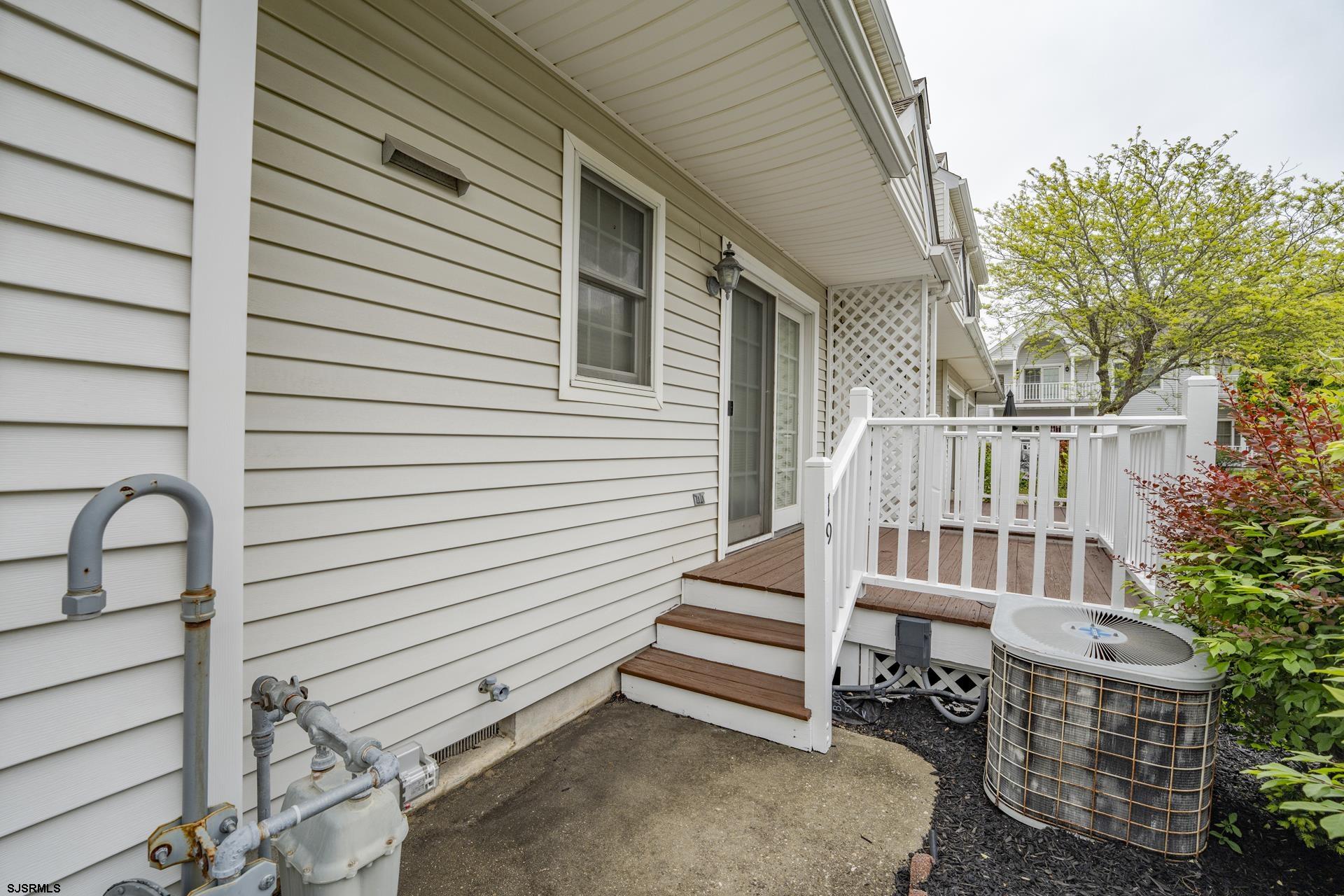 19 Clipper Court Atlantic City, NJ 08401 - Photo 32 of 53 a view of a patio with a table and chairs