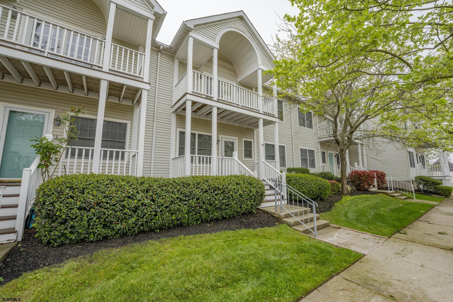 19 Clipper Court Atlantic City, NJ 08401 - Photo 33 of 53 a view of a brick house with a yard and plants