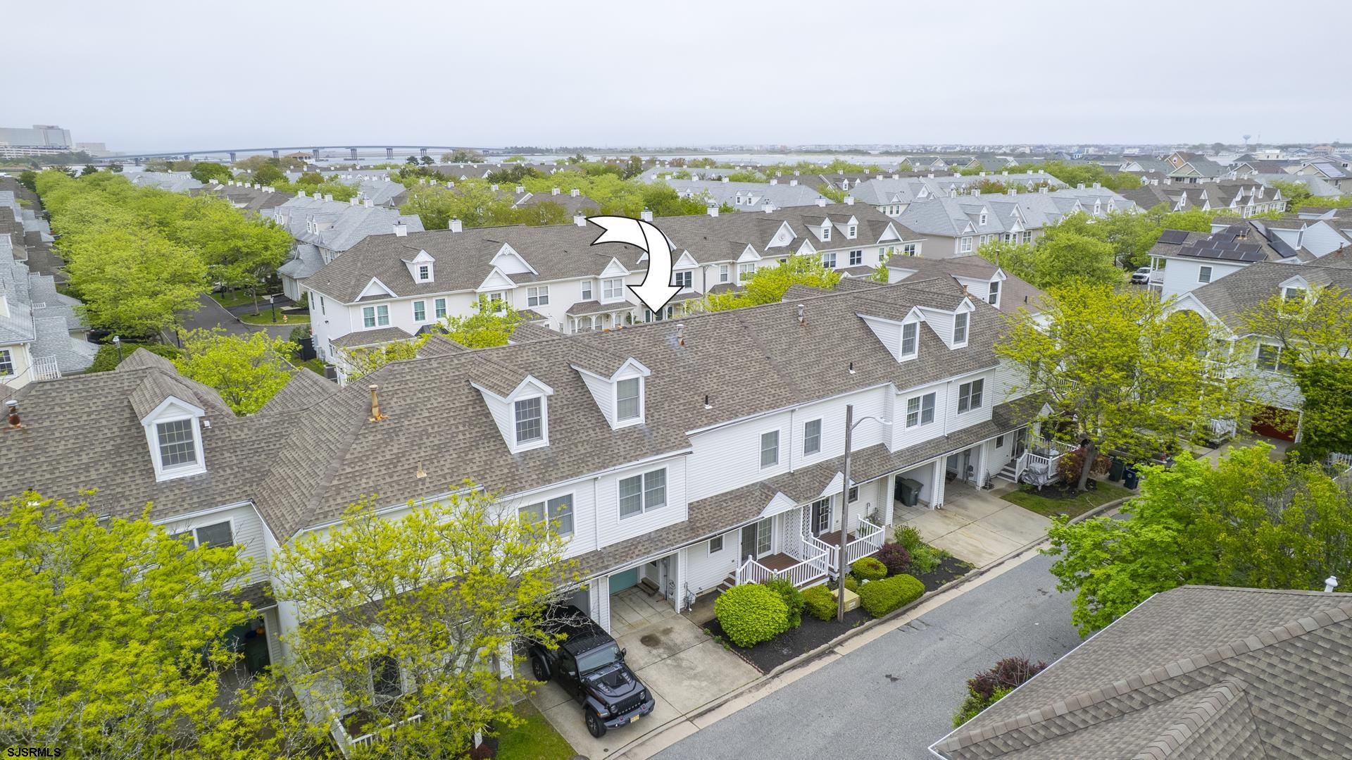 19 Clipper Court Atlantic City, NJ 08401 - Photo 42 of 53 an aerial view of a house with a swimming pool patio and mountain view